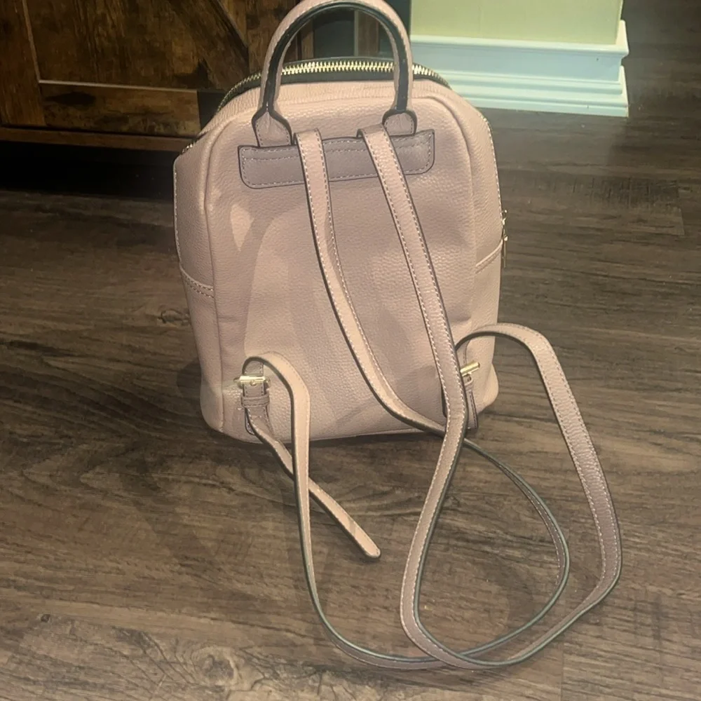small pink faux leather backpack